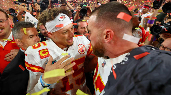 Kansas City Chiefs quarterback Patrick Mahomes (15) celebrates with tight end Travis Kelce (87) after winning Super Bowl LVII against the Philadelphia Eagles.